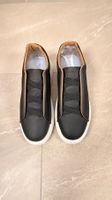 Schwarze Sneaker (Grösse ca. EU 44)
