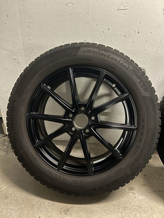 4 roues noires pneus hiver Continental 18