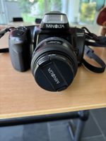 Minolta Dynax 300si analog camera with lenses and flash