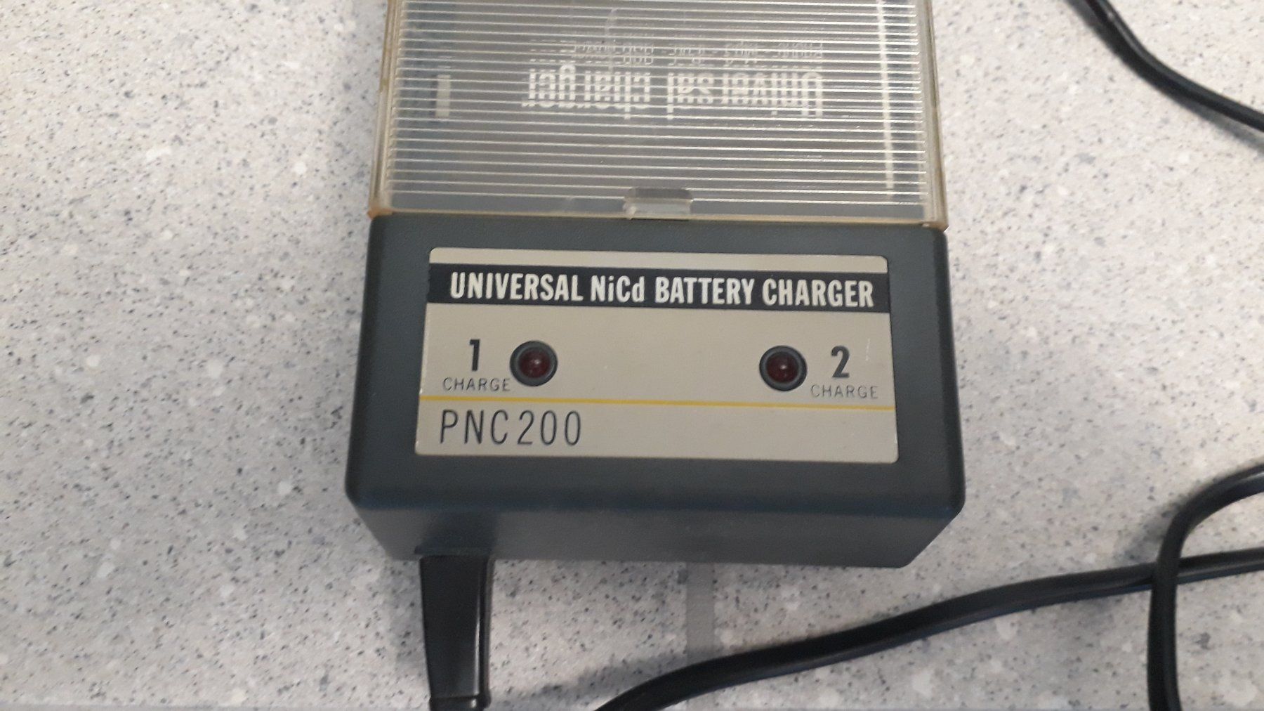 Philips Caricatori & Batterie: PHILIPS Universal NiCd Battery Charger PNC200 – Usato da Stäfa venduto da Supertramp73 1