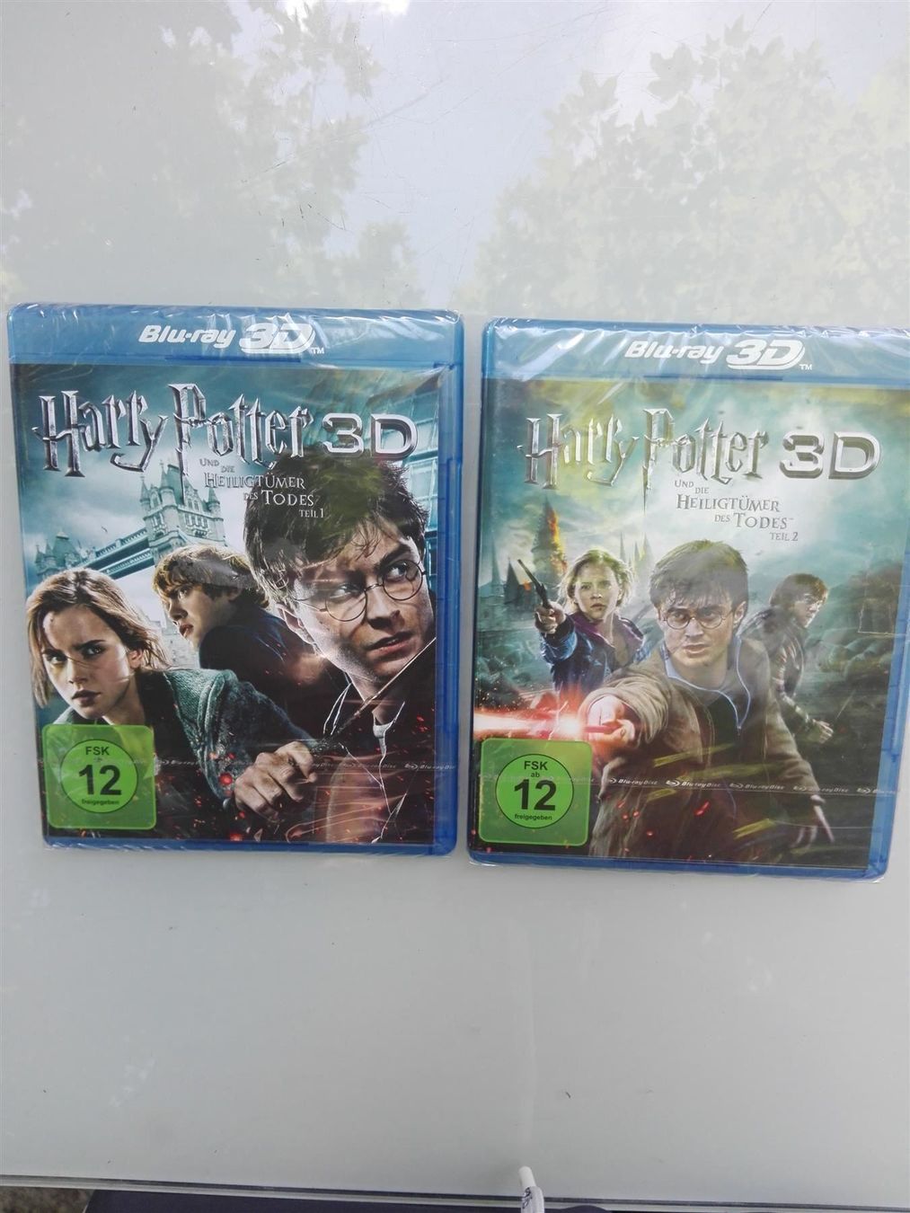 Tutti i DVDs: Harry Potter &  Heiligtümer Todes (Teil 1+2)   > 3D-Version< – Nuovo e nell'imballaggio originale da St.Gallen venduto da elk2023