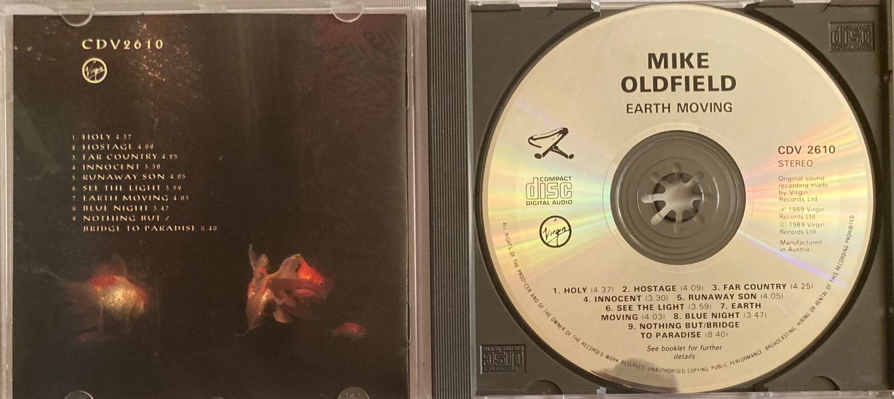 CD: MIKE OLDFIELD - EARTH MOVING – Usato da Poliez-Pittet venduto da Newtown-Records 2