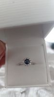 anello oro bianco con diamanti e zaffiro