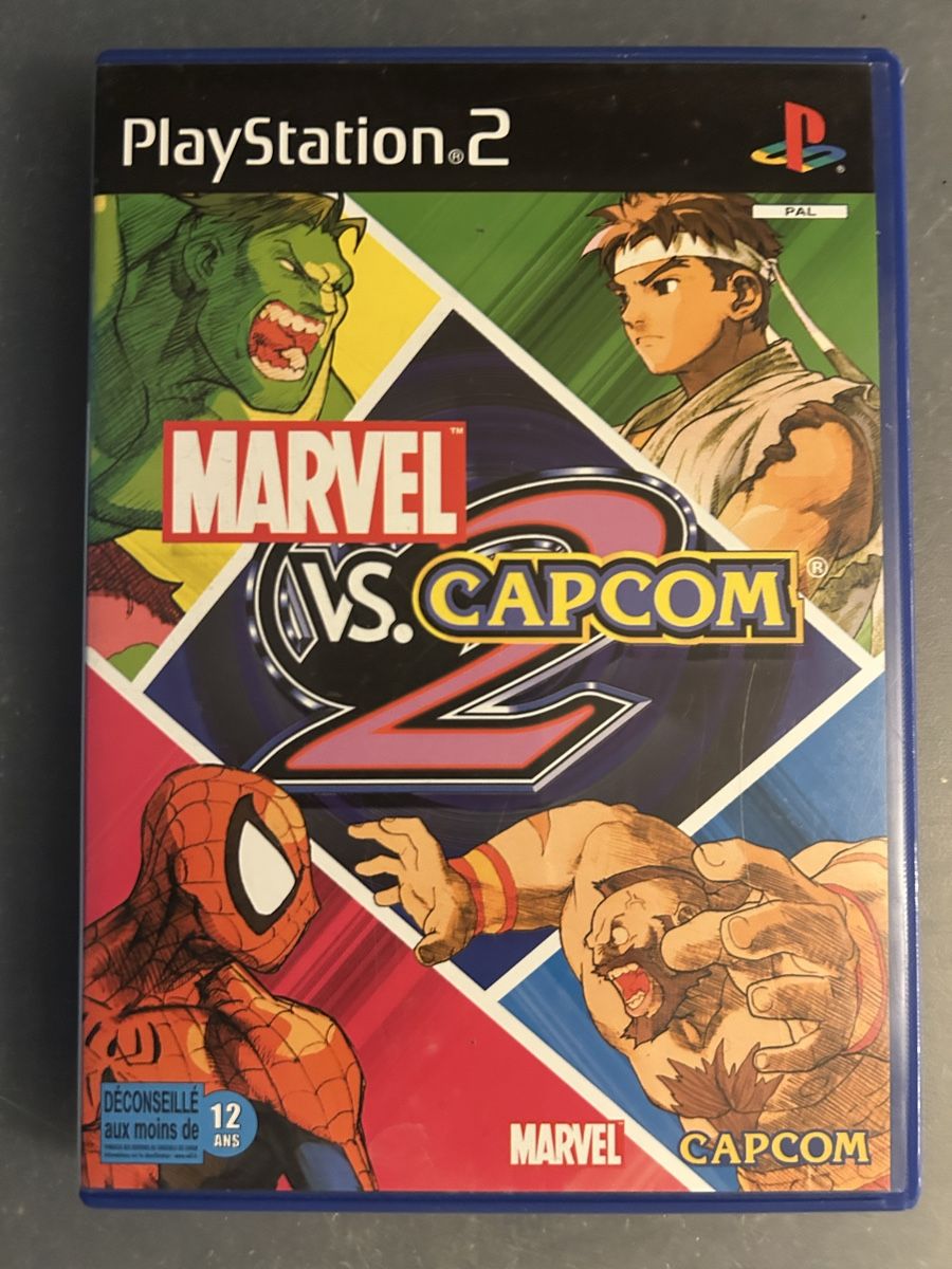 Jeux: Marcel vs Capcom 2 Français  – D'occasion à Pully par PongDayOne