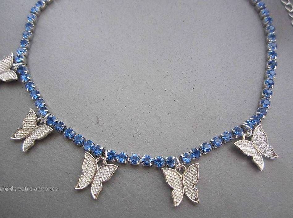 Ketten: Collier strass bleus & papillons (neuf, avec étiquette) – Gebraucht aus Lausanne von lae_w2zr 1
