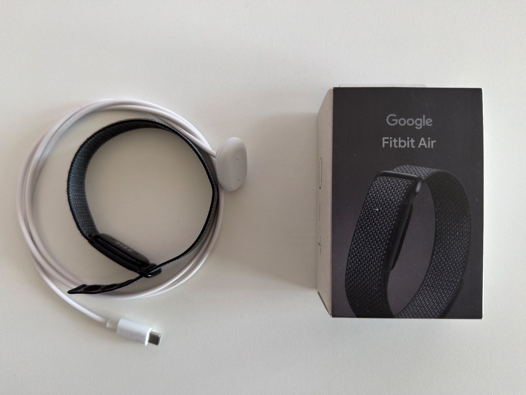 Fitbit Smartwatch: Google Fitbit Air (Obsidian/Schwarz) – Usato da Nänikon venduto da Eizo2000