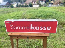 Sammelkasse Nitro, Leuchtreklame