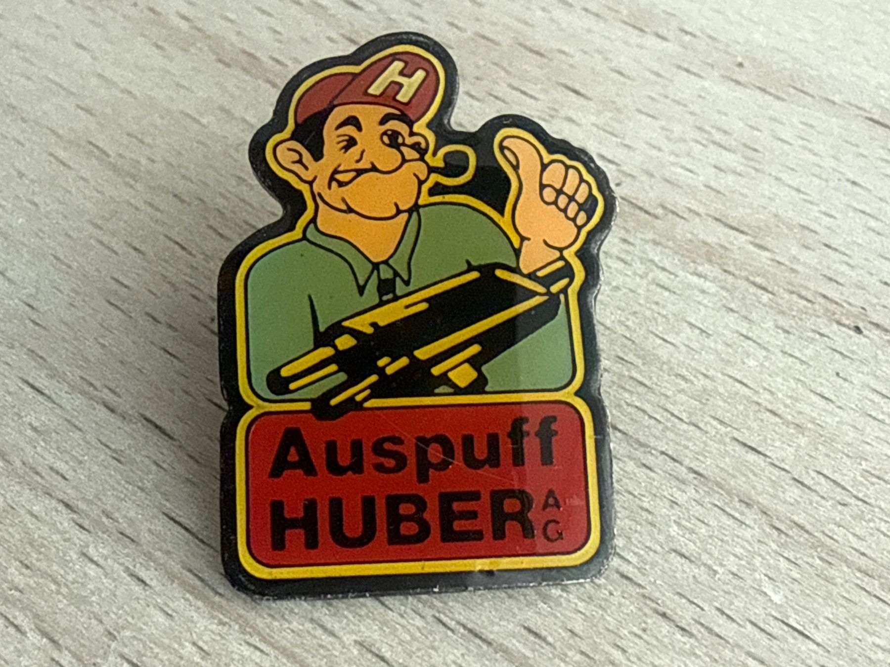 Placchette & Badge: Pin Auspuff HUBER – Usato da Glattbrugg venduto da Schweigmatt