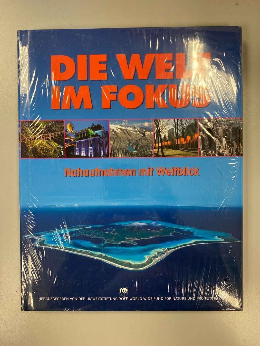 Libri: Buch Die Welt im Fokus – Nuovo e nell'imballaggio originale da Wängi venduto da Bmo