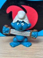 Bodybuilding-Schlumpf mit Expander