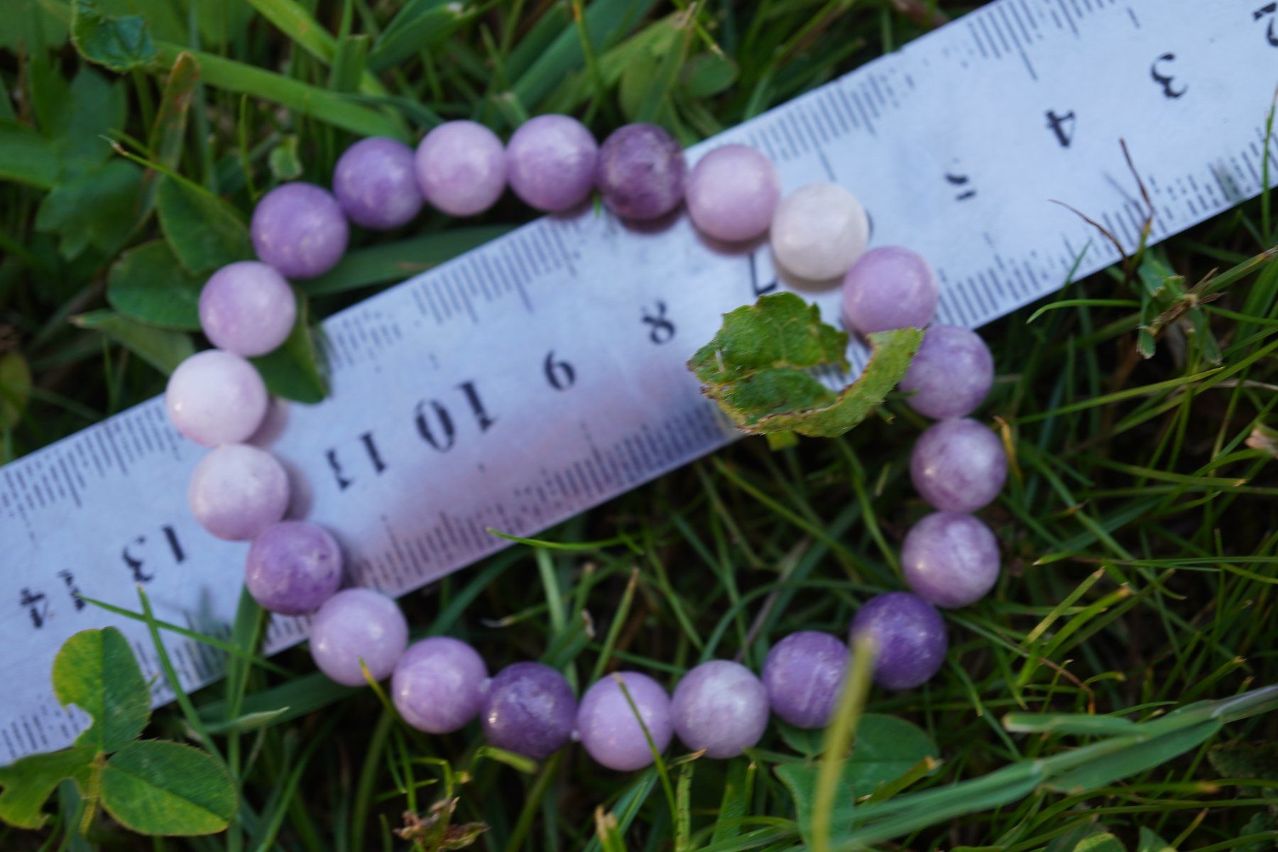 Minéraux & Lithothérapie: Lepidolith Kugel Armband mit Gummizug – Neuf avec emballage d'origine à Eschenbach SG par topstone 1
