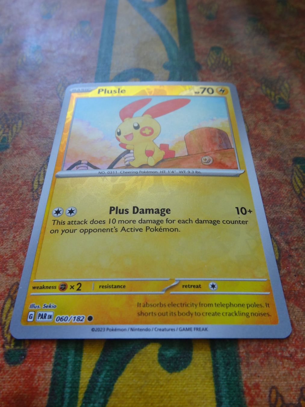 Pokémon Sammelbilder & Trading cards: POKEMON  Plusle   G  PAR EN  060/182   HP70   2023 – Gebraucht aus Romanel-sur-Lausanne von Swift13