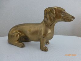 Herziger Dackel aus Bronze.