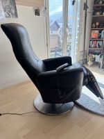 Schwarzer kunstleder mit elektrischer Relaxfunktion!