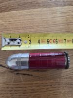 Briquet vintage forme balle Swiss Made rouge et métal