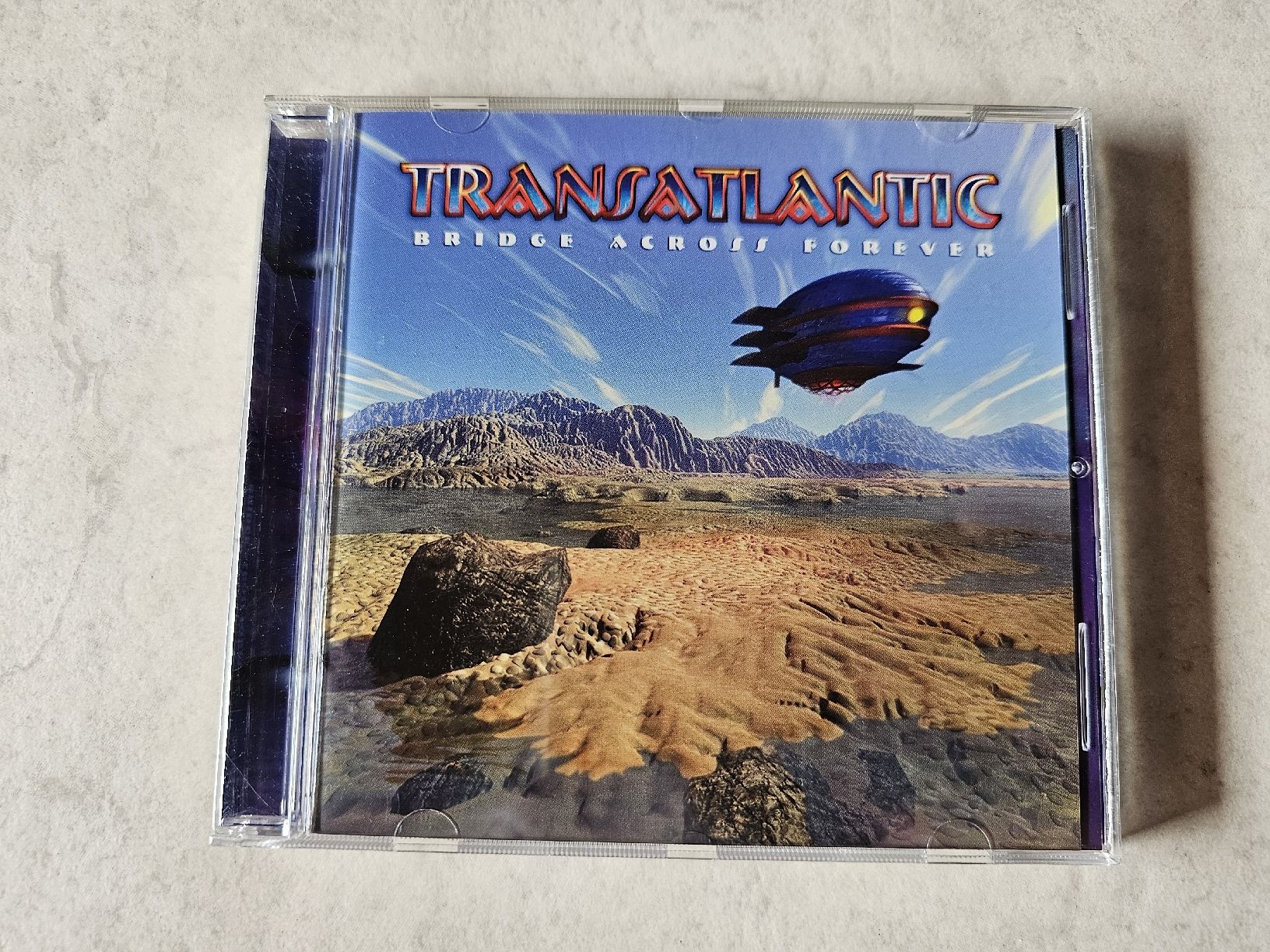 CD: Transatlantic  -  Bridge Across Forever – Usato da Schneisingen venduto da backstore24