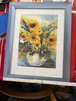 Sonnenblumen in Vase gerahmt
