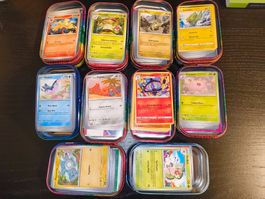 Pokemon Sammelkarten - 10 Minitins mit über 500 Karten