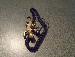 Armband Gecko, goldfarbig, weisse Steinchen