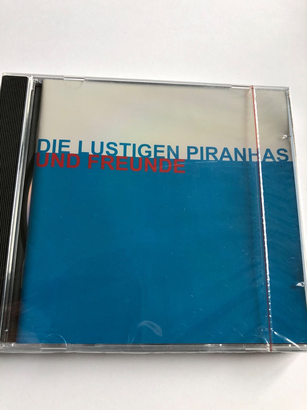 CDs: Die Lustigen Piranhas und Freunde – Neuf avec emballage d'origine à Arth par Vrecam51