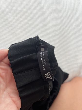 ZARA, black skirt with shorts. 