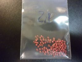 100 perles tungstène rouge met.  2,40 mm
