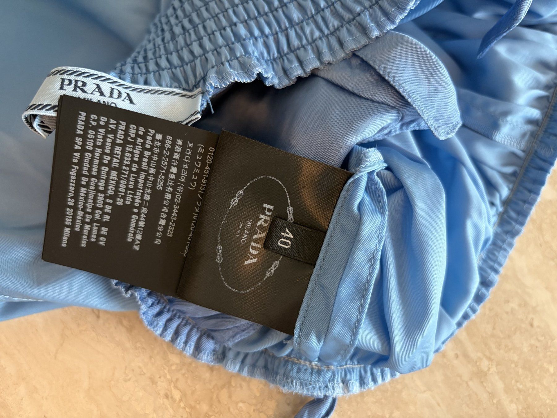 Pantaloni: Prada Re-Nylon Shorts Hellblau Triangle Logo – Usato da Kreuzlingen venduto da Jea_luxe 1