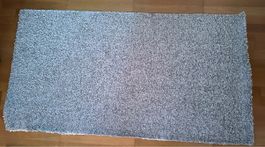 Teppich rechteckig 150x80cm grau in gutem Zustand