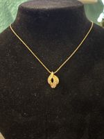 Dior Halskette mit Anhänger und Kristallen Goldfarben