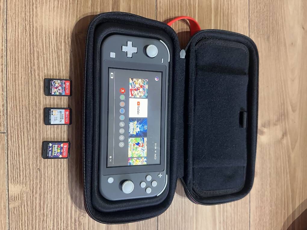 Console: Nintendo switch lite + boite + 3 jeux – Usato da Choëx venduto da tgu_7qx2
