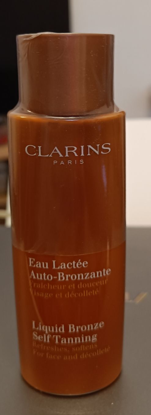 Clarins Cura del viso: Eau Lactée Auto-Bronzante 125 ml – Nuovo e nell'imballaggio originale da Genève venduto da Kamajan 1