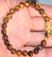 Armband B-378 – Tigerauge 8mm & Fengshui Pixiu – 21cm elast.