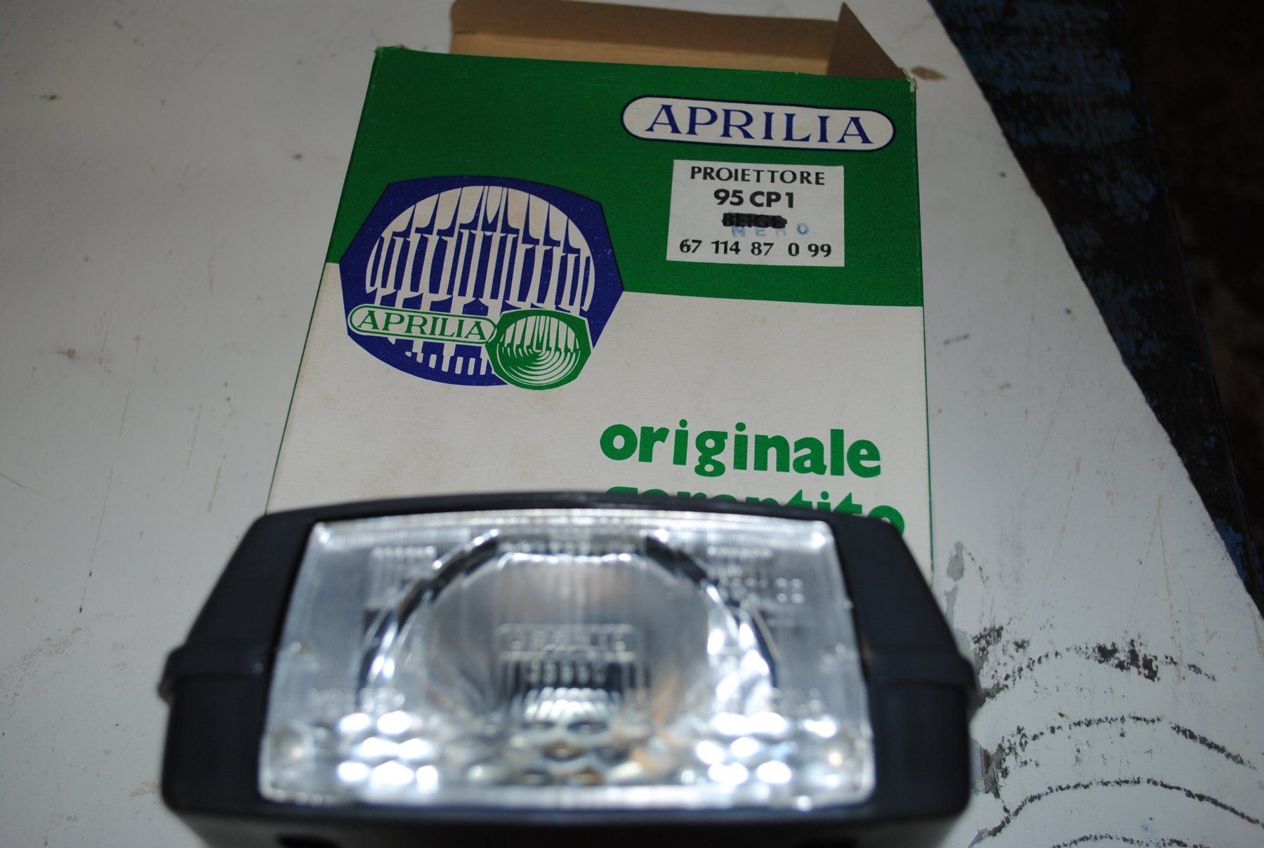 Piaggio Mofa-Ersatzteile: Lampe Scheinwerfer Piaggio Bravo  > NOS < original oldi – Neu und originalverpackt aus Subingen von Baergarage 7