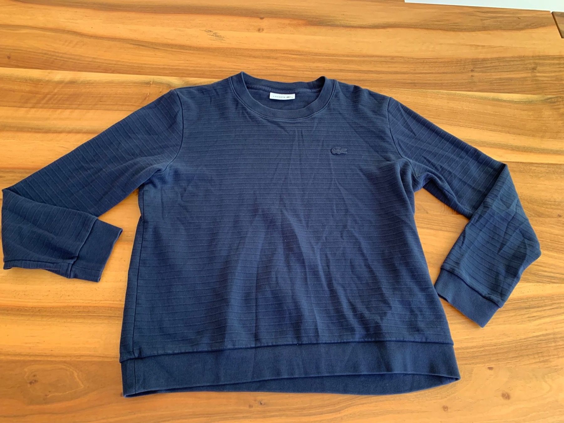 Lacoste Pullover & Sweatshirts: LACOSTE dunkelblauer Pullover Grösse 40 – Gebraucht aus Meiringen von Jwash