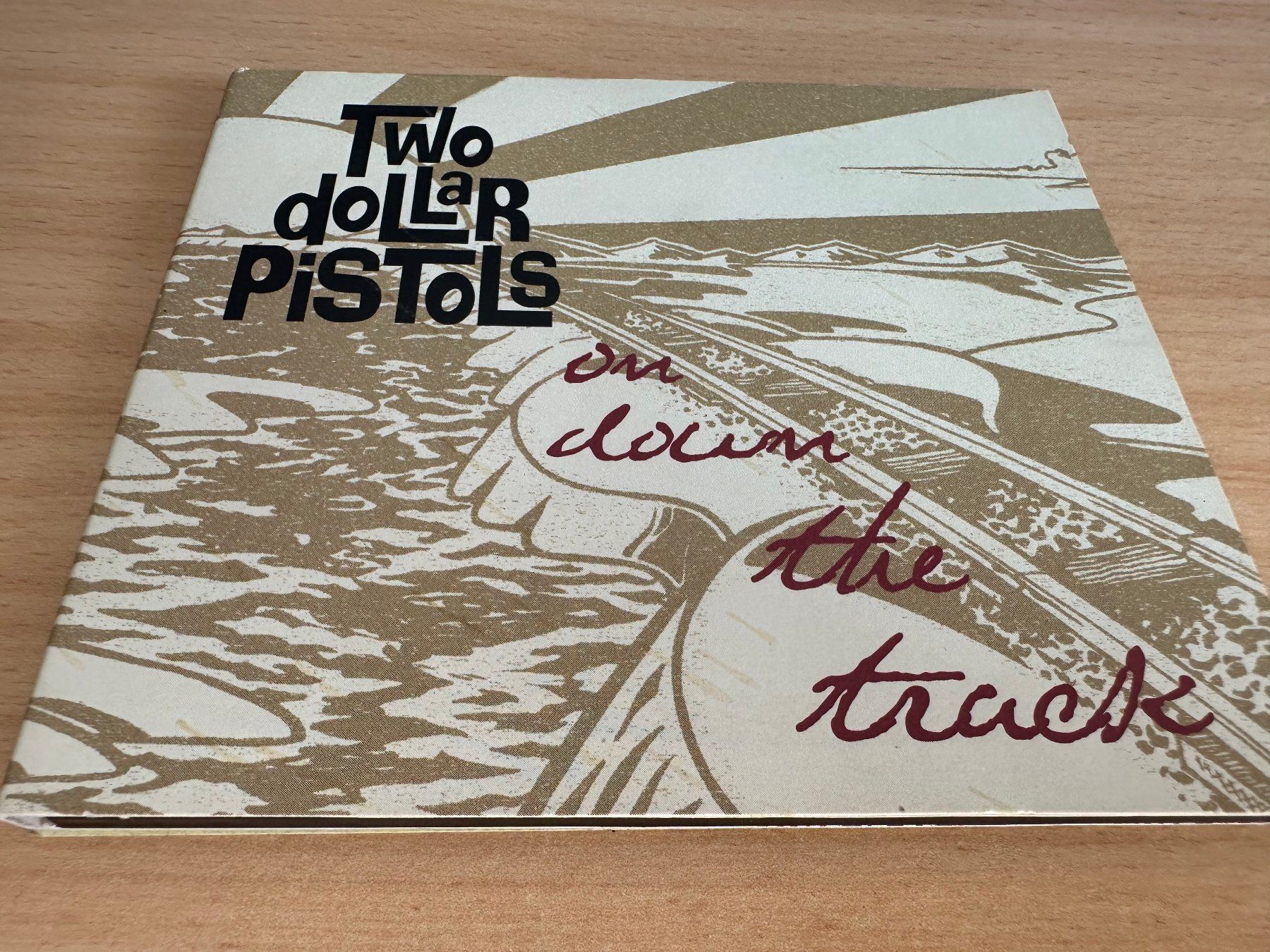 CDs: Two Dollar Pistols – On Down The Track – D'occasion à Rikon im Tösstal par Alpenmutz