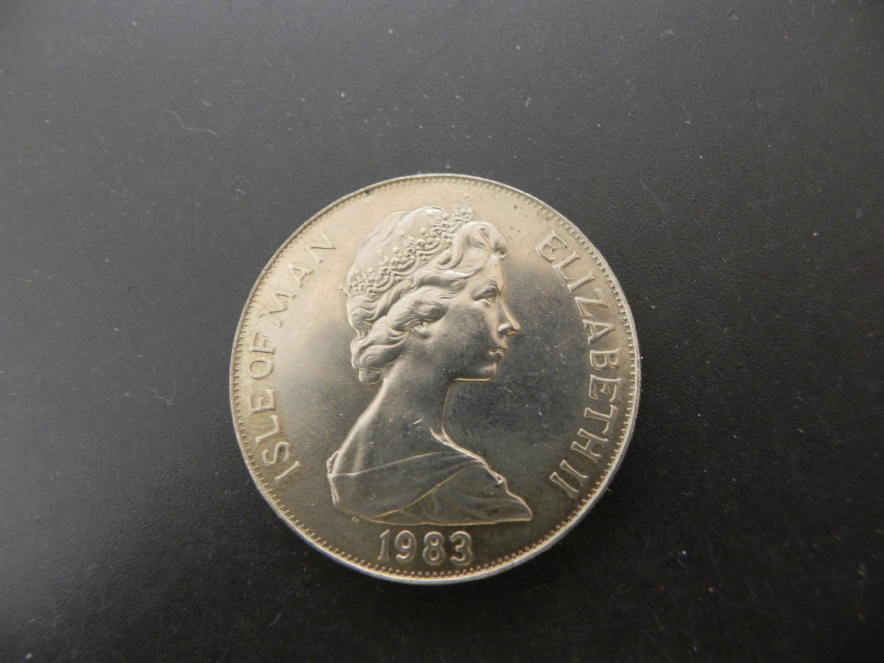 Tutti le monete: Isle of Man 1 Crown 1983 - Orbiter Space Shuttle – Usato da Biel/Bienne venduto da Gogolozi 1