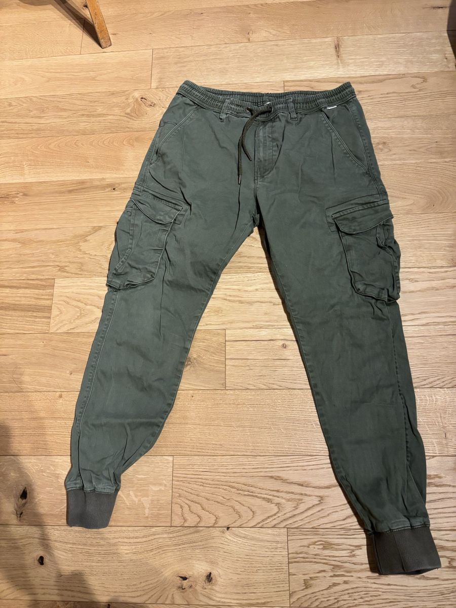 Pantaloni: Reell Reflex Rib Cargo Pants - Olive Green, Size xs – Nuovo (secondo la descrizione) da Lugano venduto da sar_hz5j