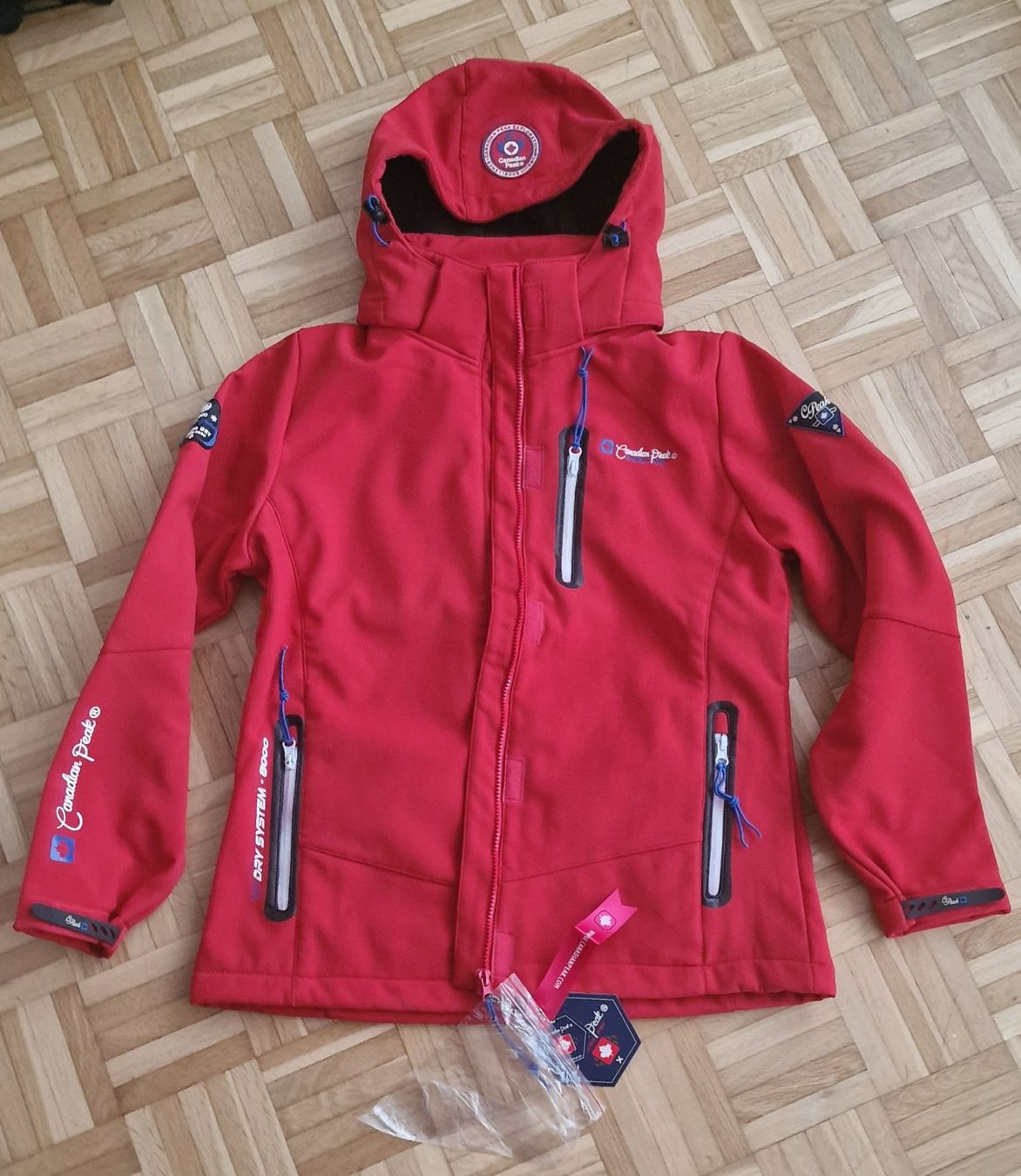 Jacken: Canadian Peak Softshelljacke Rot Gr. 4/XL - statt 159.- – Gebraucht aus Turbenthal von lau_2nrd