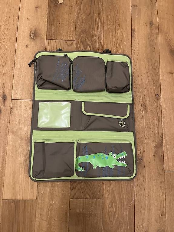 Borse & Zaini: KINDER AUTO RÜCKSITZ-ORGANIZER KROKODIL – Usato da Ottoberg venduto da yvonne.graenacher