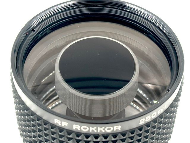 Minolta Obiettivi: Minolta RF Rokkor 250mm 5.6 Mirror / Spiegel – Usato da Seewis Dorf venduto da Plebejus 2