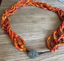 Geflochtene indische Naga Halskette orange 