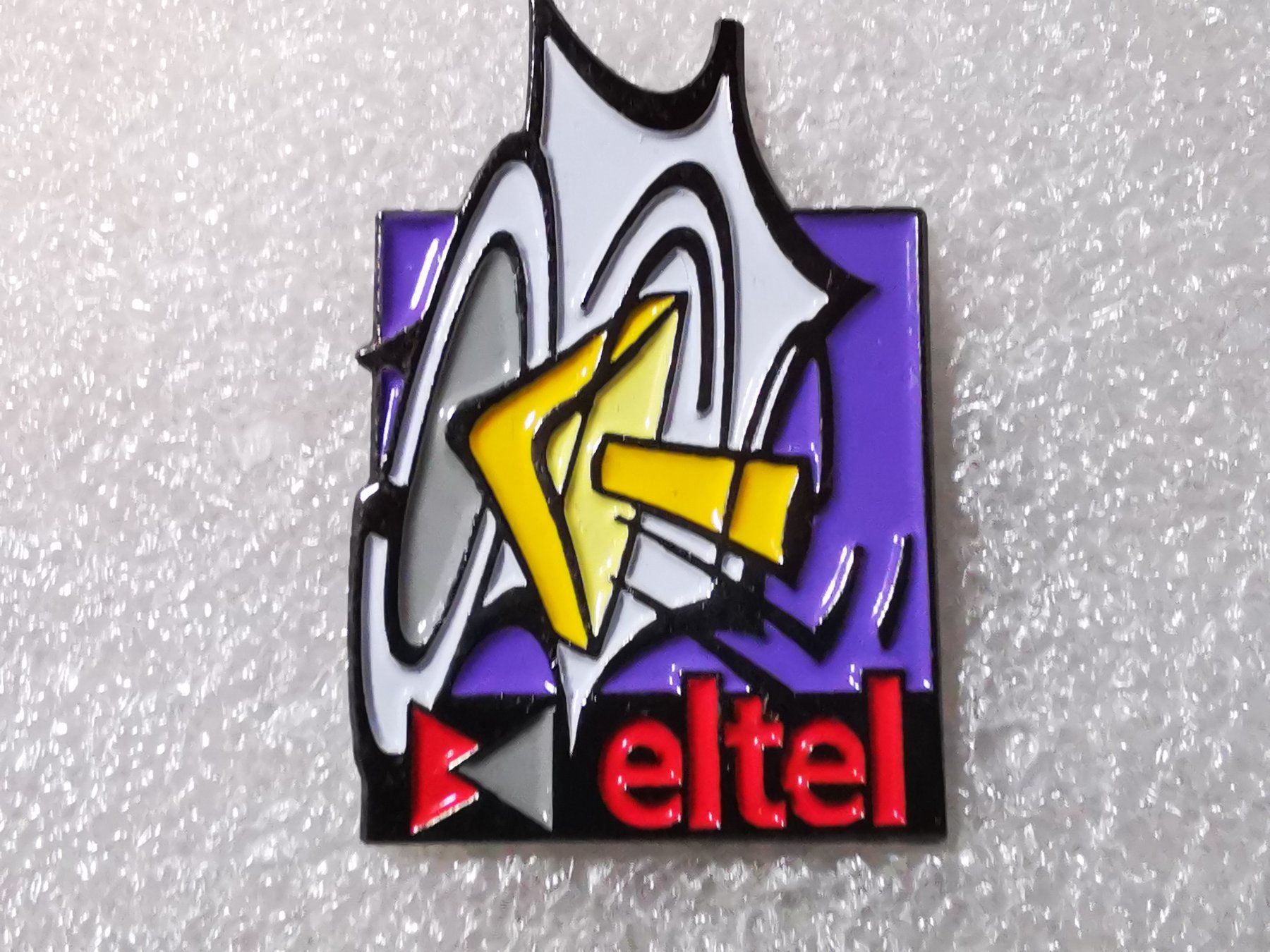 Placchette & Badge: Ansteckpin 15: eltel – Usato da Oppligen venduto da Pin-Fall-Shop