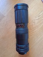 Tokina Tele-Zoom 90-230 mm f/4.5 Objektiv + Tasche
