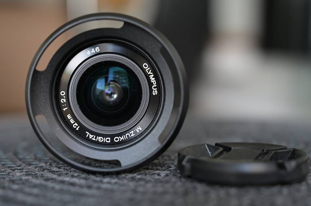 Olympus Obiettivi: Olympus / OM System 12mm f2 Objektiv – Usato da Dübendorf venduto da seadart 1