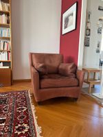 Fauteuil en cuir marron confortable en bon état occasion