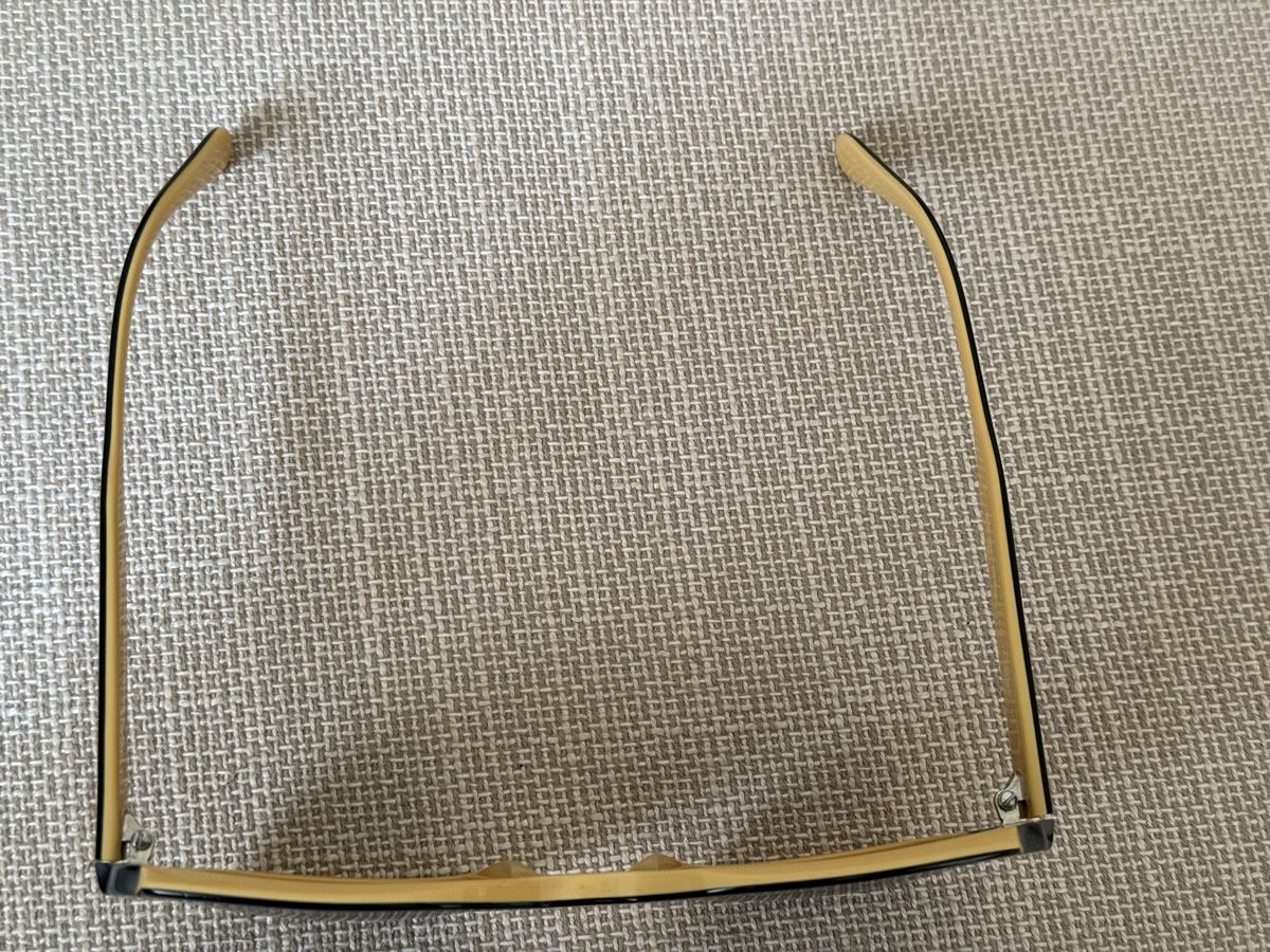 Prada Occhiali & Lenti: Lunettes de soleil noir/jaune/marron Prada – Usato da Tavannes venduto da Thriftshop 4