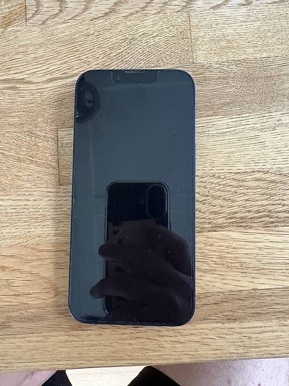 Portables: iPhone 14 128 GB schwarz  – D'occasion à St. Gallen par chr_83