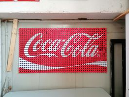 Originelle Coca-Cola Wanddekoration