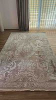 Wohnzimmerteppich beige mit Ornamenten gebrauchter Zustand