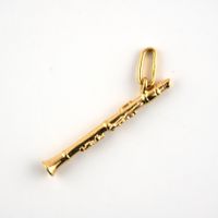Goldanhänger 18K Musikinstrument